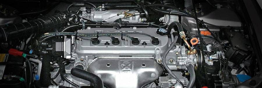 2.3-литровый бензиновый силовой агрегат Honda F23A под капотом Хонда Одиссей.