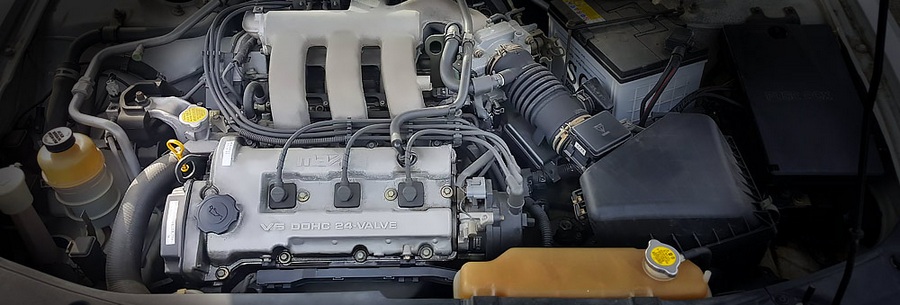 2.0-литровый бензиновый силовой агрегат Mazda KF-ZE под капотом Мазда Эфини.