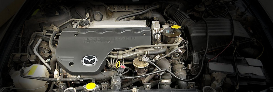 2.0-литровый дизельный силовой агрегат Mazda RF под капотом Мазда 626.