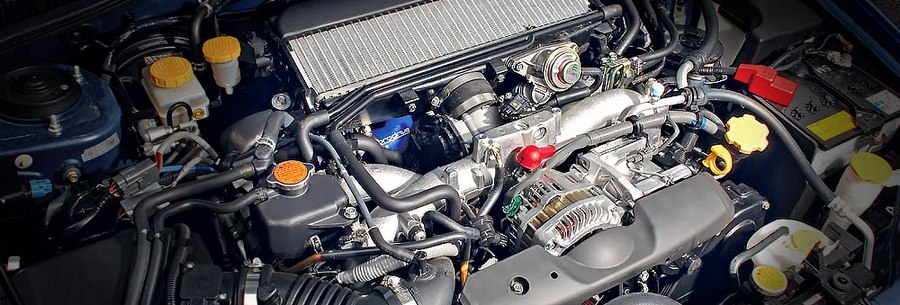 2.0-литровый бензиновый силовой агрегат Subaru EJ205 под капотом Субару Форестер.
