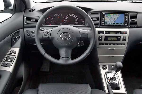 Тойота Королла 9 (Е120) интерьер торпедо после обновления