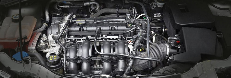 1.6-литровый бензиновый силовой агрегат Ford IQDB под капотом Форд Фокус.