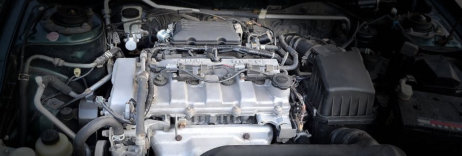 2.0-литровый бензиновый силовой агрегат Mazda FS-ZE под капотом Мазда Капелла.
