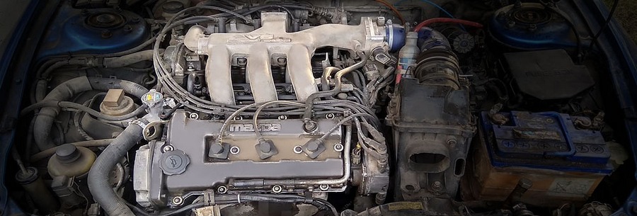 1.8-литровый бензиновый силовой агрегат Mazda K8-ZE под капотом Мазда Еунос.