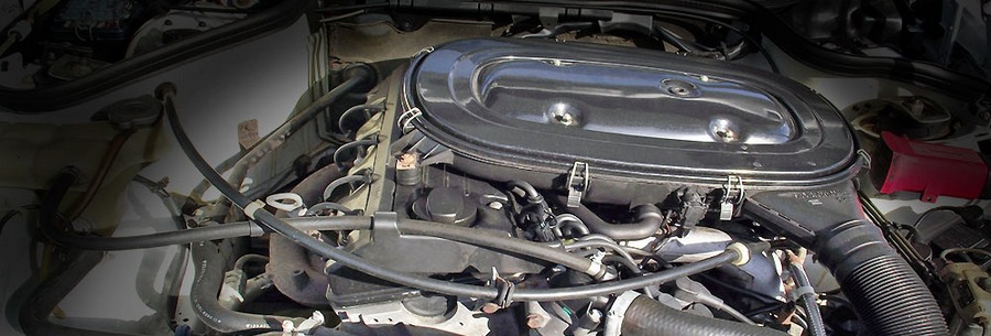 1.8 - 2.3-литровый бензиновый силовой агрегат Mercedes M102 под капотом Мерседес 190.