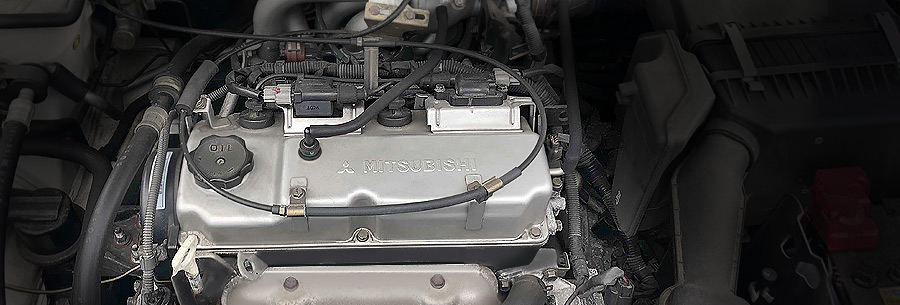 1.6-литровый бензиновый силовой агрегат Mitsubishi 4G18 под капотом Митсубиси Лансер 9