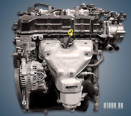 1.8-литровый бензиновый мотор Ниссан QG18DD вид сзади.