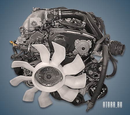 2.5-литровый бензиновый мотор Ниссан RB25DE фото.