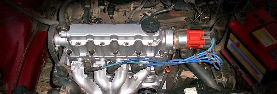 1.4-литровый бензиновый силовой агрегат Opel C14NZ под капотом Опель Астра.
