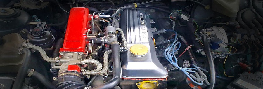 2.4-литровый бензиновый силовой агрегат Opel C24NE под капотом Опель Фронтера.