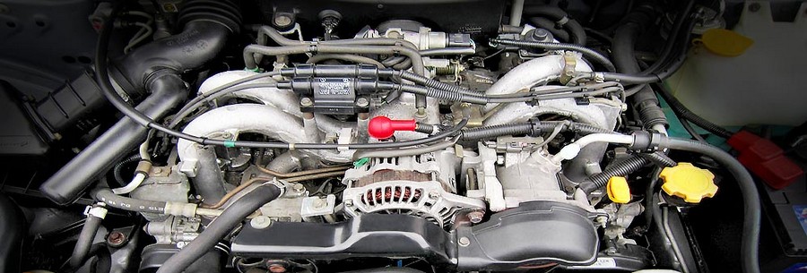 1.5-литровый бензиновый силовой агрегат Subaru EJ151 под капотом Субару Импреза.