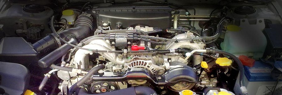 1.5-литровый бензиновый силовой агрегат Subaru EJ152 под капотом Субару Импреза.