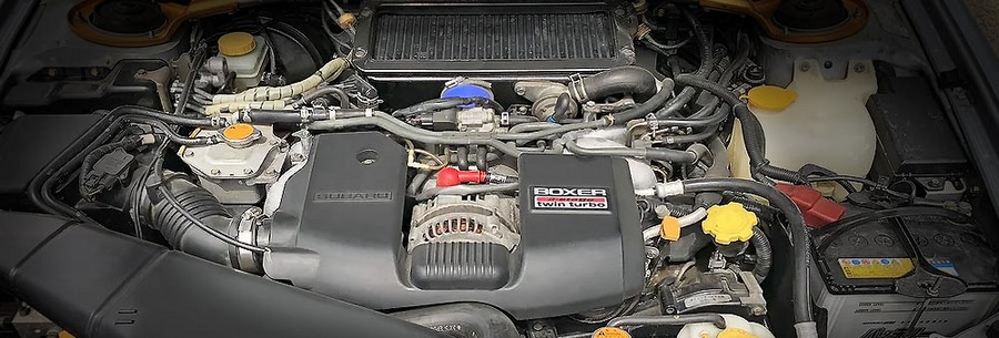 2.0-литровый бензиновый силовой агрегат Subaru EJ208 под капотом Субару Легаси.