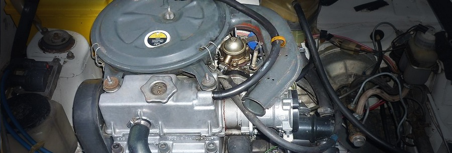 0.65-литровый бензиновый силовой агрегат ВАЗ 1111 под капотом Оки.